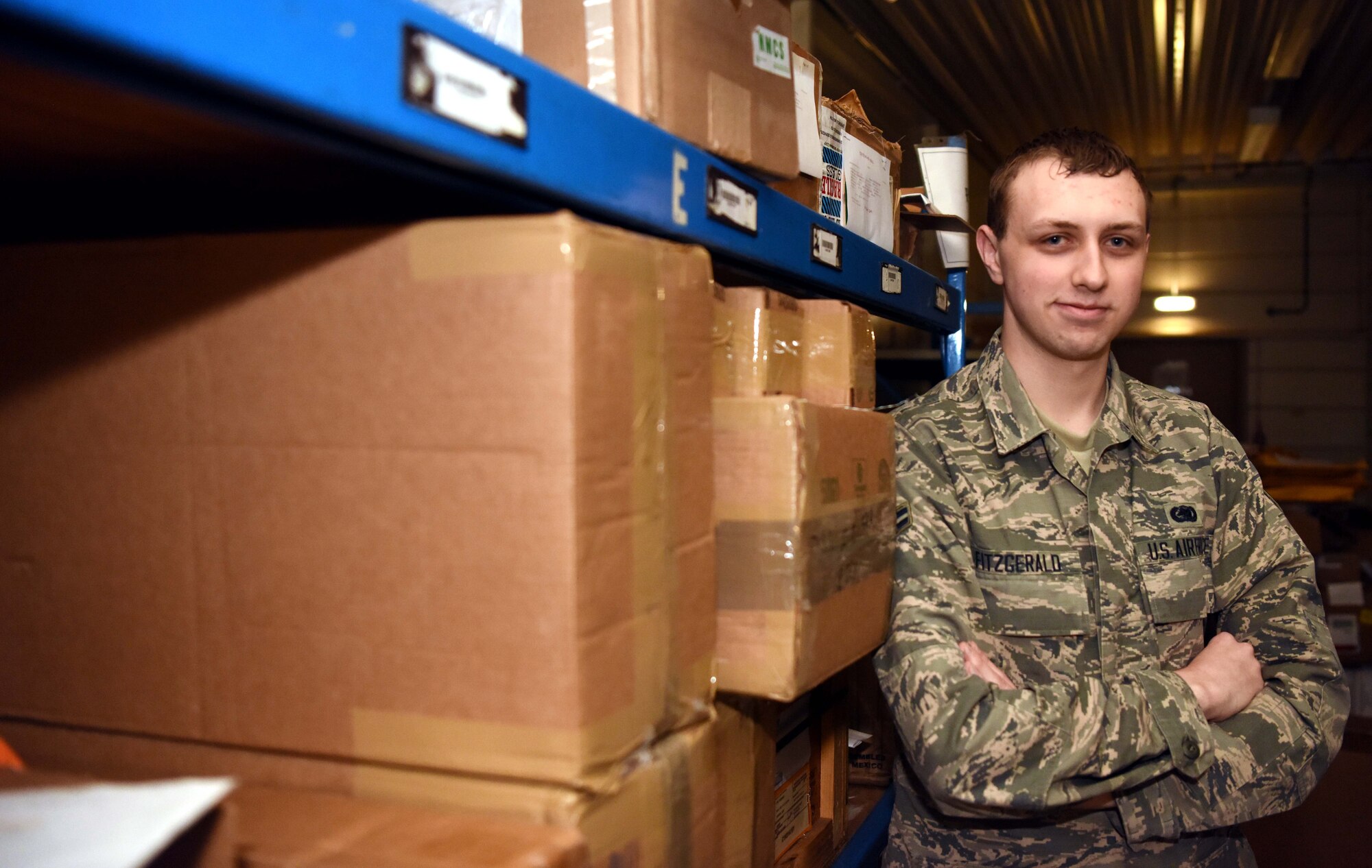 Airman 1st Class Patrick Fitzgerald, 100th Logistics Readiness Squadron flight service center technician, poses for a photo at RAF Mildenhall, England, April 15, 2020. The FSC Airmen are a part of materiel management and are tasked with managing and distributing Air Force assets to various units. (U.S. Air Force photo by Senior Airman Brandon Esau)