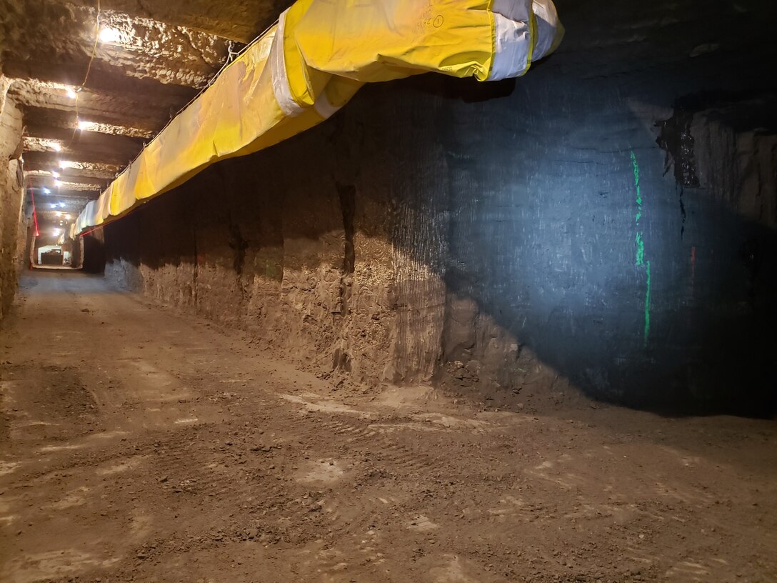 The south adit of theEngineerCold Regions Research and Engineering Laboratory's Permafrost Tunnel Research Facility in Fox, Alaska, is clear after the refrigeration evaporator units and safety walkways were removed and more than 50-feet of its interior was improved. The improvements were part of phase four of the expansion of the permafrost tunnel, which excavated a 300 foot tunnel and improved 200 feet of pre-existing tunnel.