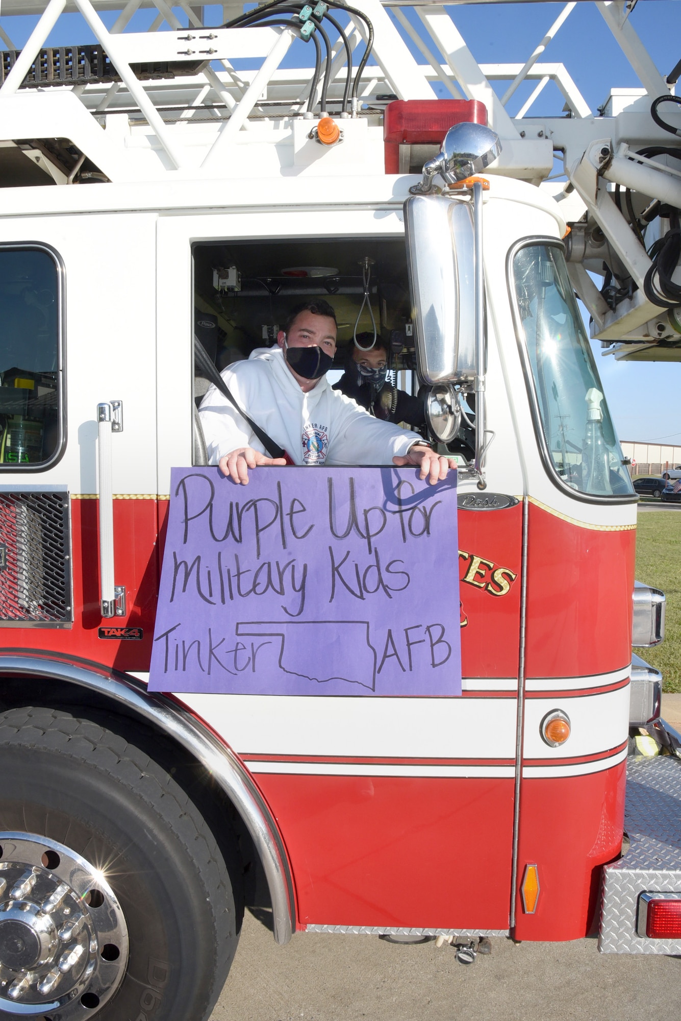 Firefighters from Tinker Fire and Emergency Services joined in the fun of the inverse parade at Child Development Center South on April 16, 2020.
