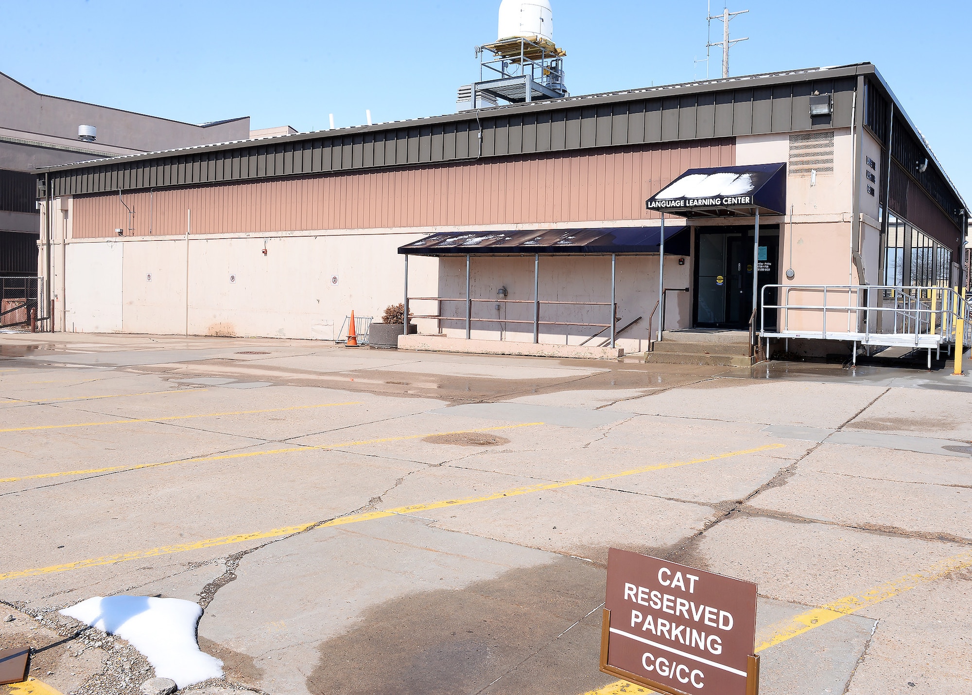 Image of Language Learning Certer with empty parking lot.