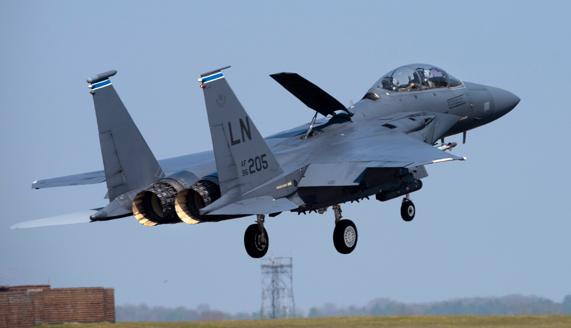 An F-15E Strike Eagle assigned to the 492nd Fighter Squadron prepares to touch down at Royal Air Force Lakenheath, England, April 16, 2020. The 492nd FS conducts routine training to ensure the Liberty Wing brings unique air combat capabilities to the fight when called upon by U.S. Air Forces in Europe-Air Forces Africa. (U.S. Air Force photo by Airman 1st Class Jessi Monte)