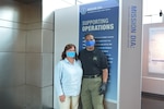 Jen Courtney, chief of the Defense Intelligence Agency's Office of Security, and DIA Police Chief Andre Tibbs wear face coverings made and donated by DIA officer Meredith Nunn.