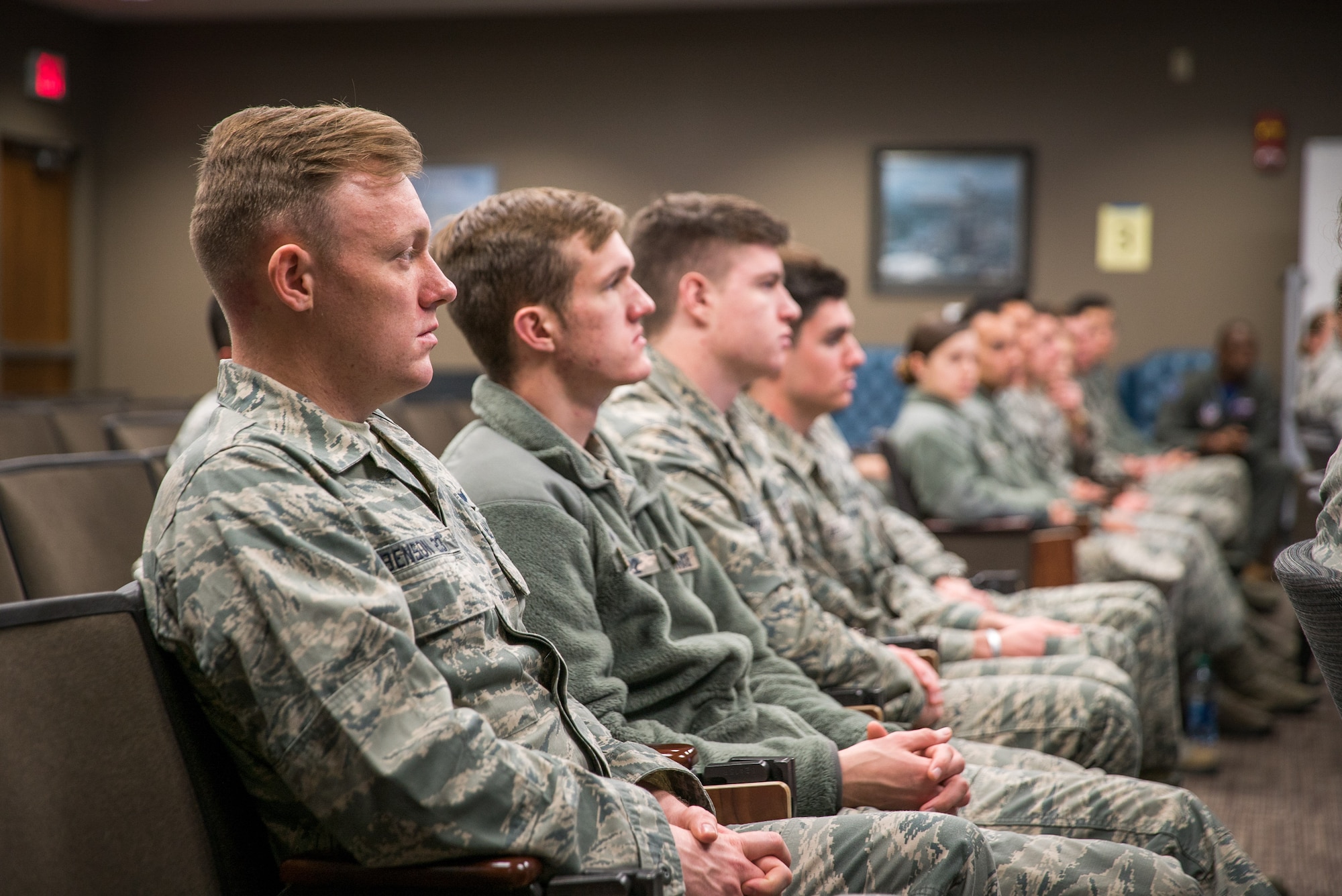 Air Force cadets listen to a briefing