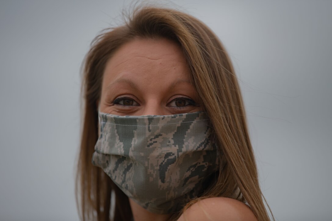 Kelly Miller, Dyess Spouse's Club president, smiles under a face-mask at Dyess Air Force Base, Texas, April 14, 2020.