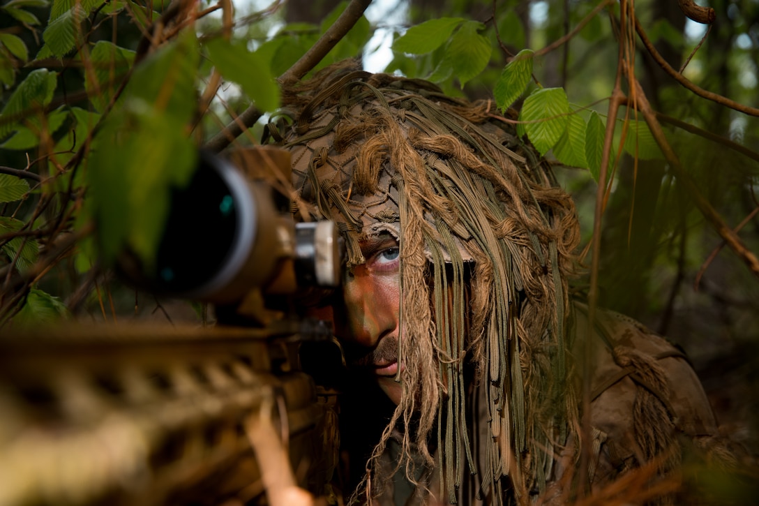 Sgt. Joshua Olsen, scout sniper with 2nd Battalion, 2nd Marine Regiment, 2nd Marine Division, poses for a photo at Camp Lejeune, N.C., April 6, 2020. "I try to set the example for my Marines," said Olsen, a Colorado Springs, Colo., native. "I want them to know that its possible to achieve the goals they set for themselves if they try hard enough.” According to his leadership, Olsen set the example by earning Honor Graduate, Highest Shooter and Highest Stalker in his Scout Sniper Basic Course. He is serving as a team leader. (U.S. Marine Corps photo by Lance Cpl. Jacqueline Parsons)