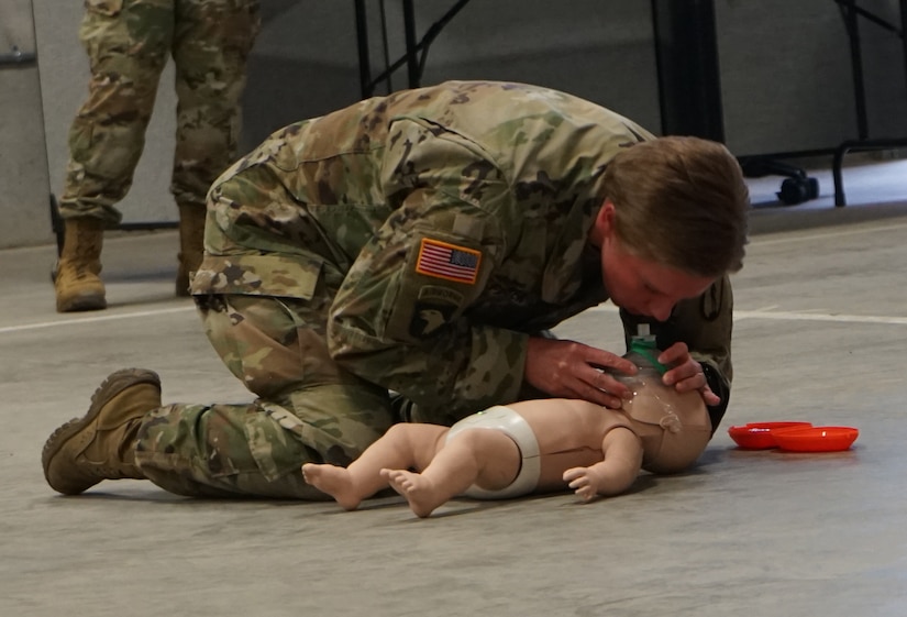 Soldiers and Airmen from the Pennsylvania National Guard perform the written evaluation of the American Red Cross CPR certification on April 13, 2020