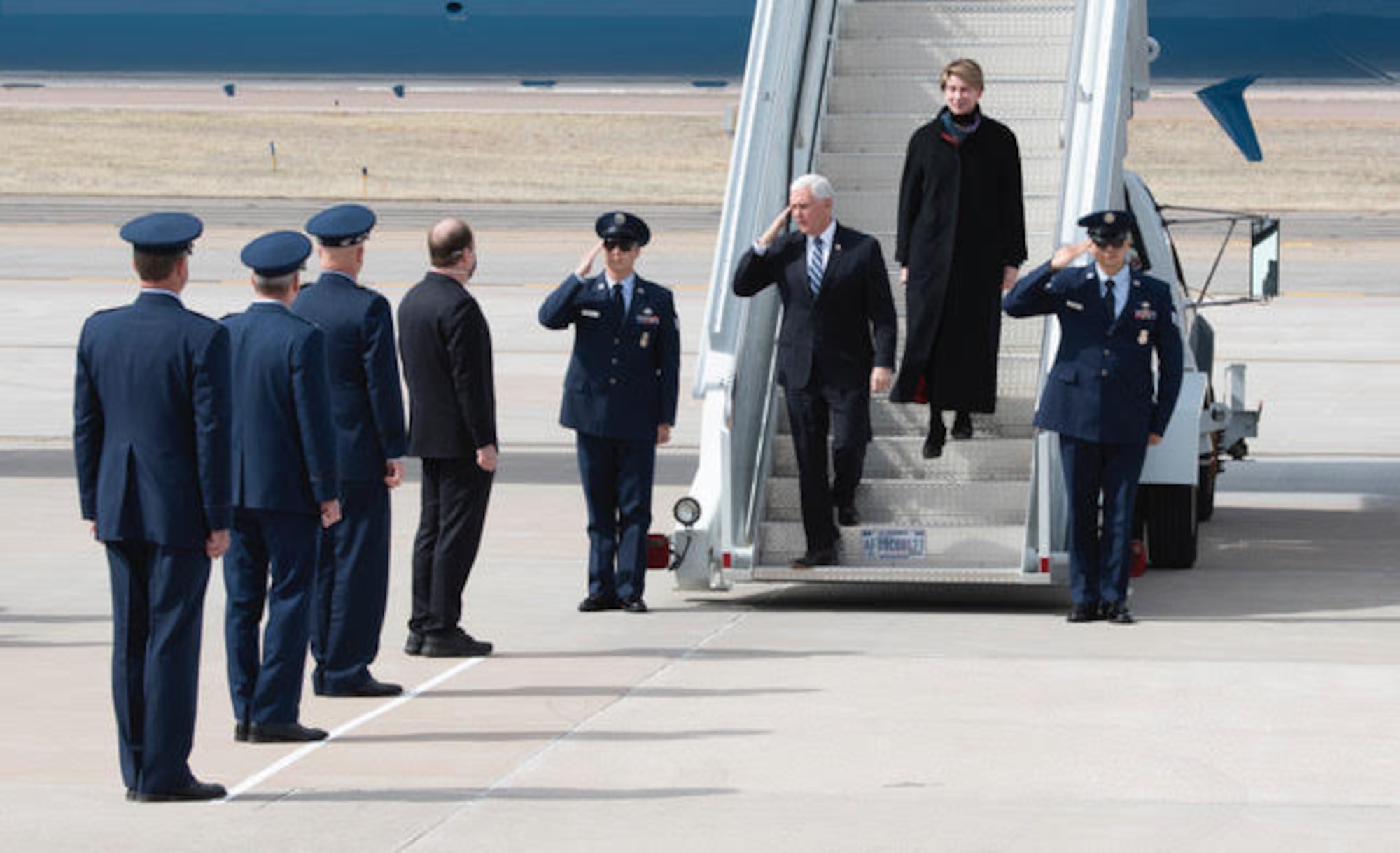 PETERSON AIR FORCE BASE, Colo. – Vice President Mike Pence greets Colorado Governor Jared Polis, General John “Jay” Raymond, and U.S. Space Force Chief of Space Operations and commander of U.S. Space Command, General Terrence O’Shaughnessy, commander of U.S. Northern Command and Northern American Aerospace Defense Command, and Col. Thomas Falzarano, 21st Space Wing commander, as he exits his aircraft on Peterson Air Force Base, Colorado, April 18, 2020. Pence came to Colorado Springs to speak at the U.S. Air Force Academy graduation which included 86 cadets from USAFA to commission directly into the U.S. Space Force, becoming the very first company grade officers in the new service. (U.S. Air Force photo by Staff Sgt. Alexandra M. Longfellow)