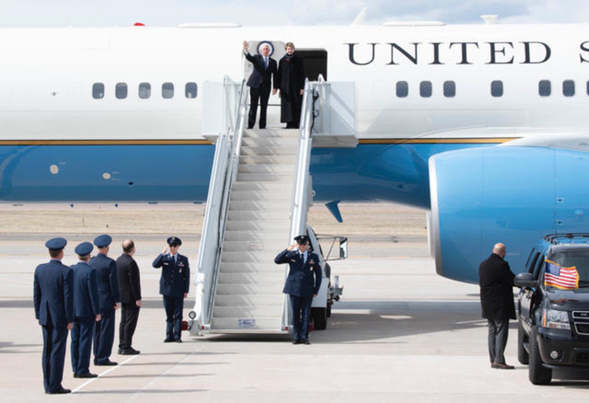 PETERSON AIR FORCE BASE, Colo. – Vice President Mike Pence along with the Secretary of the Air Force Barbara Barrett, wave to onlookers as he exits Air Force One on Peterson Air Force Base, Colorado, April 18, 2020. The vice president came to Colorado Springs to speak at the U.S. Air Force Academy graduation which included 86 cadets from USAFA to commission directly into the U.S. Space Force, becoming the very first company grade officers in the new service. (U.S. Air Force photo by Staff Sgt. Alexandra M. Longfellow)
