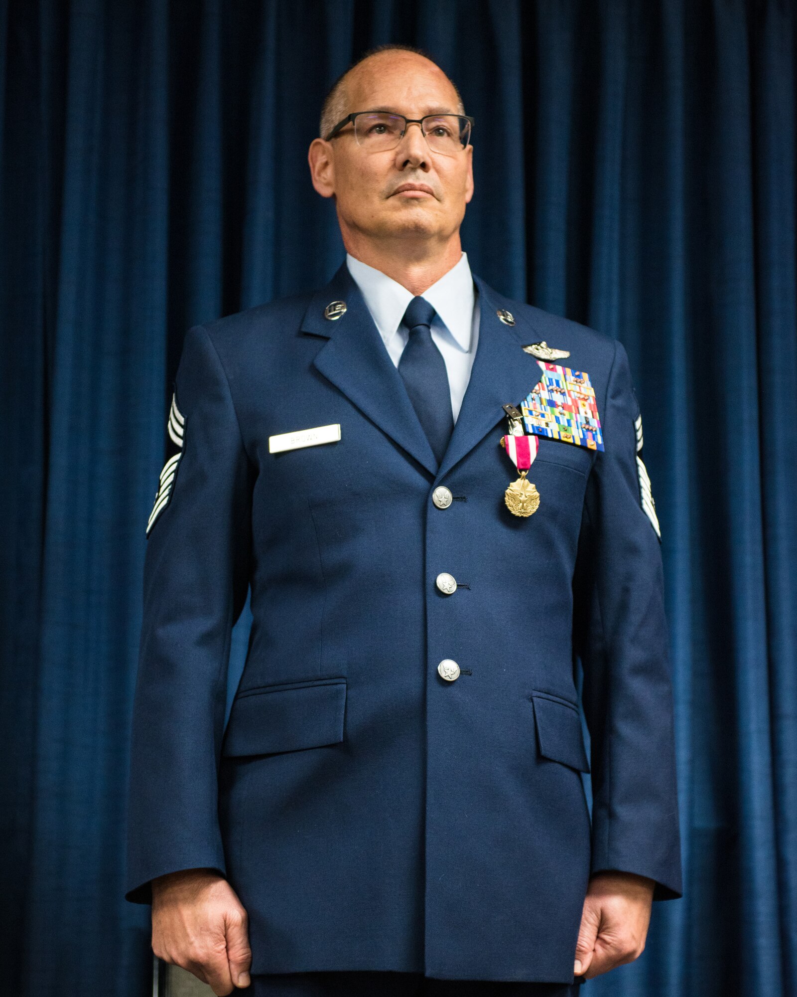 Chief Master Sgt. Jeffrey Brown, a loadmaster supervisor with the 165th Airlift Squadron, retires from 38 years of military service during a ceremony at the Kentucky Air National Guard Base in Louisville, Ky., Dec. 7, 2019. (U.S. Air National Guard photo by Senior Airman Chloe Ochs)