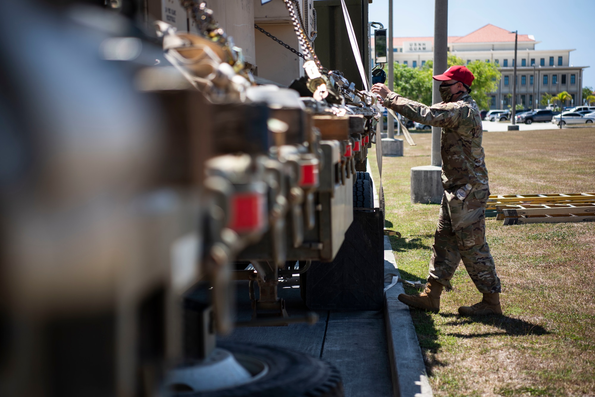 An Airman from the 554th RED HORSE Squadron prepares to unload medical supplies for the Expeditionary Medical Support System facility April 13, 2020, at U.S. Naval Hospital Guam.