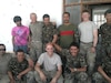 Eleven men pose for picture. Four American Soldiers and seven host nation Afghan Soldiers.