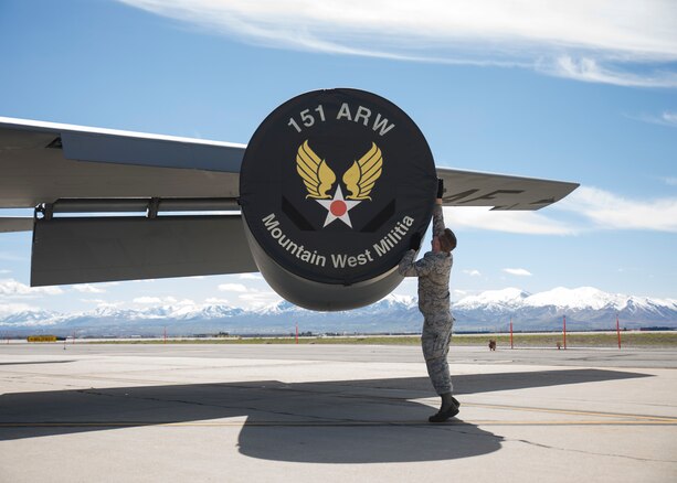 Staff Sgt. Tanner Bugger, a KC-135R crew chief assigned to the 151st Aircraft Maintenance Squadron, attaches an engine cover to a KC-135R Stratotanker assigned to the 151st Air Refueling Wing at Roland R. Wright Air National Guard Base, Salt Lake City, Utah, April 17, 2019.