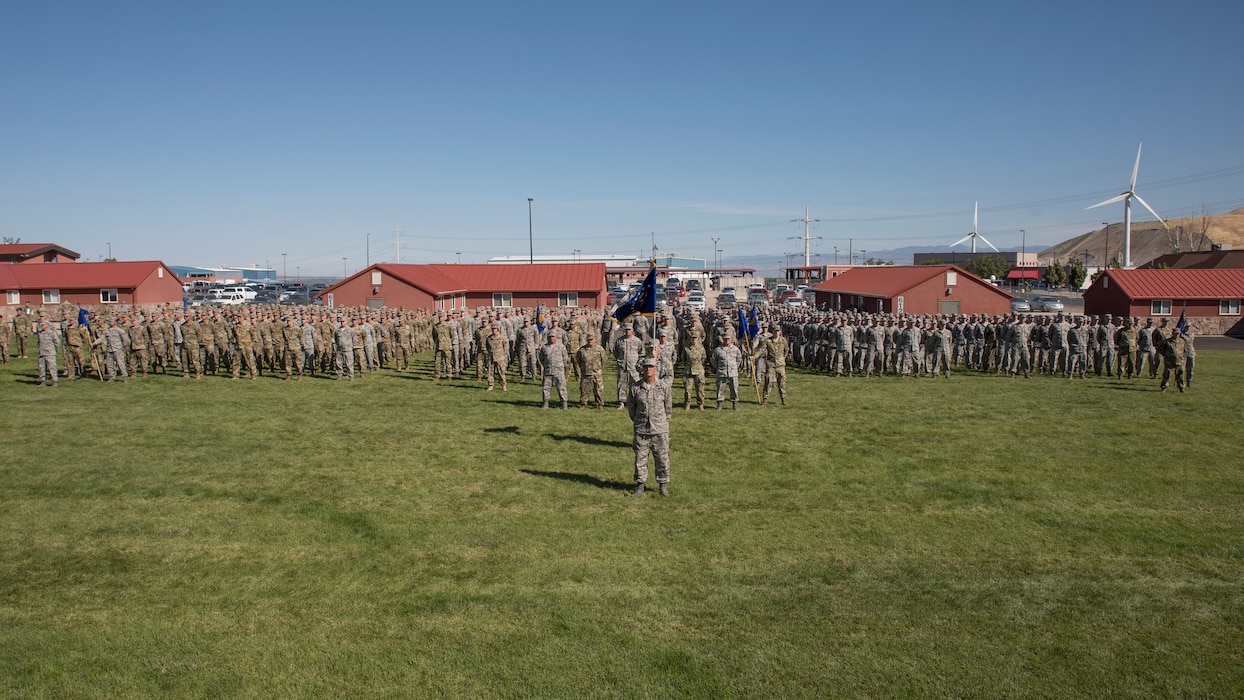 Airmen assigned to the Utah Air National Guard and 151st Air Refueling Wing stand ready for the pass-and-review at the annual Governor’s Day celebration at Camp Williams, Utah, September 14, 2019