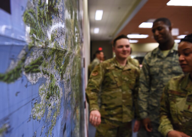 U.S. Air Force students from the 315th Training Squadron participate in Operation Lonestar, the capstone project for the four pipeline intelligence analyst students, in the 313th Training Squadron schoolhouse on Goodfellow Air Force Base, Texas, March 5, 2020. The capstone project is the first time the 315th TRS’s All Source Intelligence Analysts, the Geospatial Intelligence Imagery Analysts, Targeting Analysts and Intelligence Officers integrate in one learning environment. Note: This photo was taken before COVID-19 reached Goodfellow, the students and instructors are now practicing precautions and proper safety measures during the capstone. (U.S. Air Force photo by Airman 1st Class Abbey Rieves)