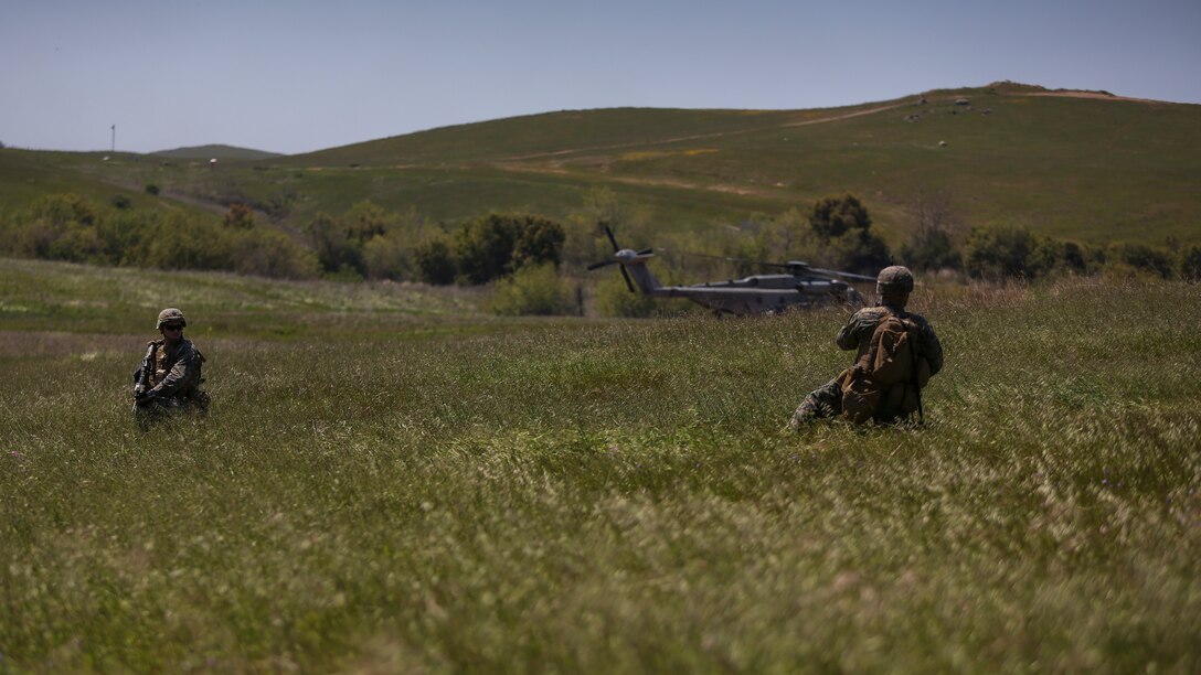 U.S. Marines with 2nd Battalion, 4th Marine Regiment, 1st Marine Division, set up a perimeter for a Tactical Recovery of Aircraft and Personel (TRAP) on Marine Corps Base Camp Pendleton, Calif., April 14,2020. The training was held to ensure consistent operational capability as 3rd MAW remains ready to support short notice, world-wide deployments while following necessary precautions to protect the health of the force. (U.S. Marine Corps photo by Lance Cpl. Jaime Reyes)