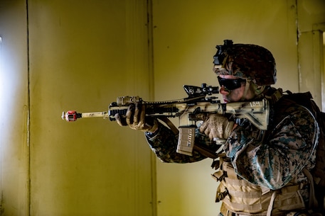 U.S Marine Corps Cpl. Jacob Cimini, a rifleman with Company F, 2nd Battalion, 4th Marine Regiment, 1st Marine Division, sets security during the Expeditionary Operations Training Group evaluation on Marine Corps Base Camp Pendleton, California, March 19, 2020. The Marines of Company F conducted boat raids during both day and night for their culminating exercise in preparation for deployment. (U.S. Marine Corps photo by Lance Cpl. Benjamin Aulick)