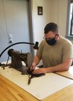 Airman making mask
