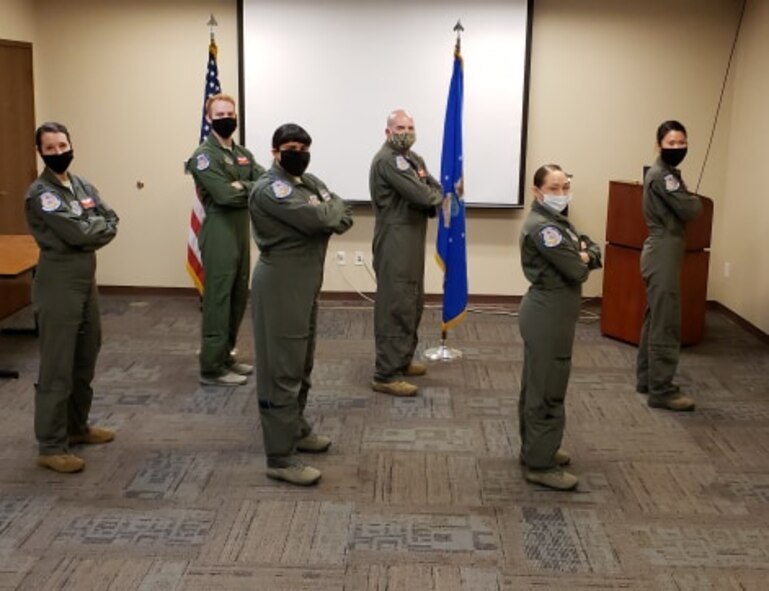 Airmen stand in loose formation