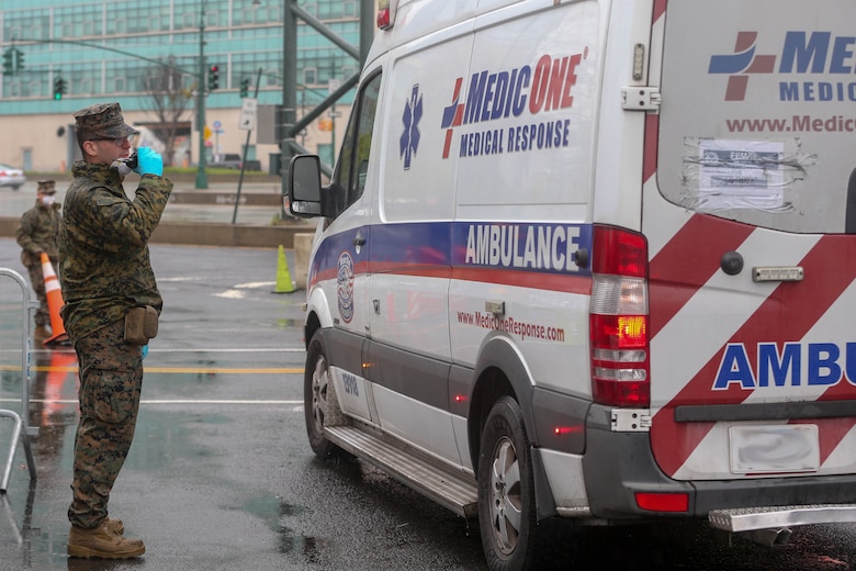 Lance Cpl. Anthony Edwards, a rifleman with Lima Company, 3rd Battalion, 2nd Marines, Task Force New York, stands a security watch during COVID-19 relief efforts in New York City, New York, April 18, 2020. Comfort cares for trauma, emergency and urgent care patients without regard to their COVID-19 status. Comfort is working with the Javits New York Medical Station as an integrated system to relieve the New York City medical system, in support of U.S. Northern Command’s Defense Support of Civil Authorities as a response to the COVID-19 pandemic. (U.S. Marine Corps photo by Sgt. Stormy Mendez)