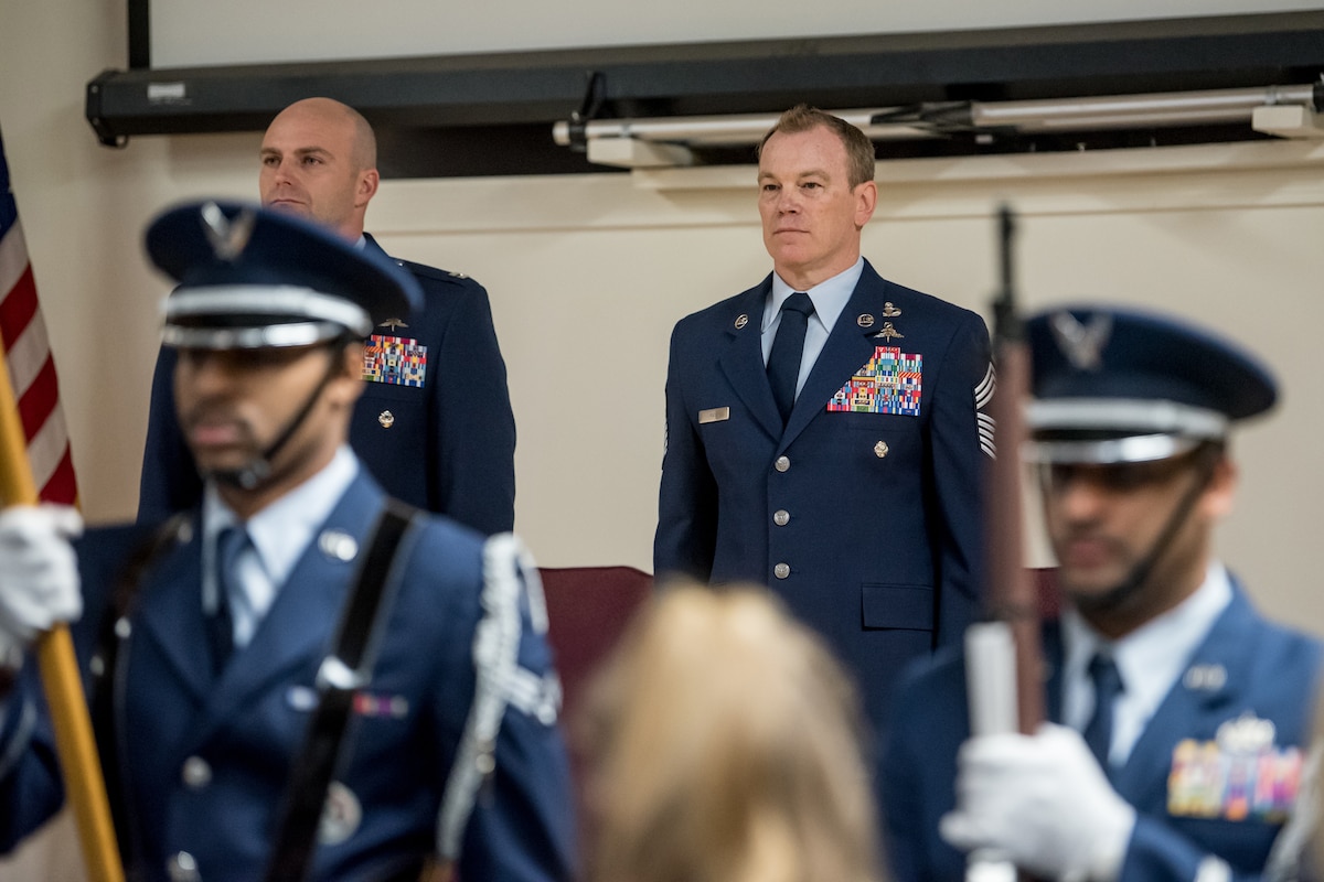 The 123rd Airlift Wing Color Guard presents the colors during the retirement ceremony of Chief Master Sgt. Aaron May, the outgoing chief enlisted manager for the 123rd Special Tactics Squadron, at the Kentucky Air National Guard Base in Louisville, Ky., on Dec 7, 2019. May is retiring after more than 26 years of service to the Kentucky Air National Guard and U.S. Air Force. (U.S. Air National Guard photo by Staff Sgt. Joshua Horton)