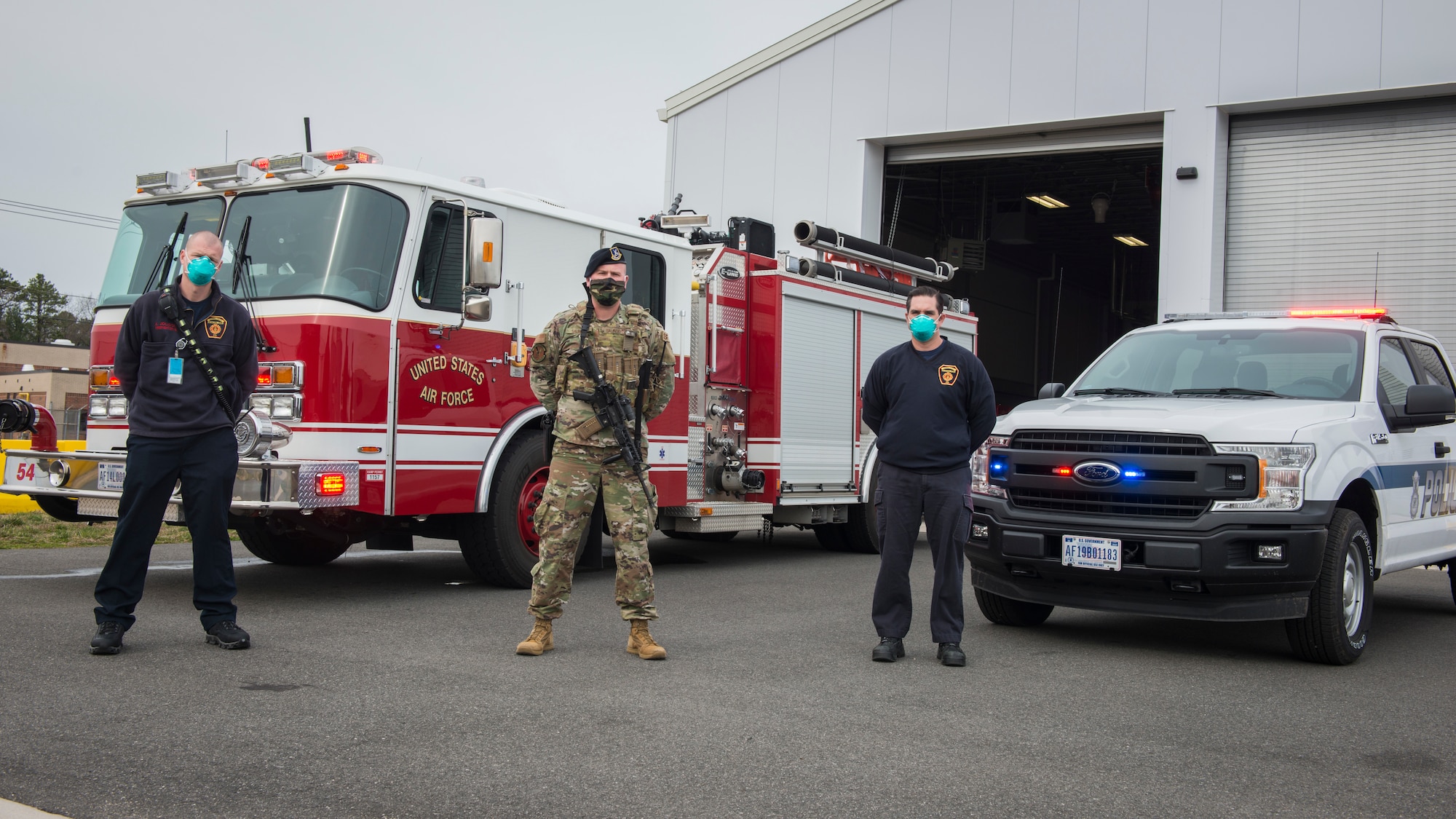 Connecticut Air National Guard fire department and Security Forces personnel at the Bradley Air National Guard Base fire house in East Granby, Connecticut, April 20, 2020. The base fire department and 103rd Security Forces Squadron continue to operate around the clock to ensure the safety and security of Connecticut Air National Guard personnel and provide support to mutual aid emergency response partners during the COVID-19 pandemic. (U.S. Air National Guard photo by Staff Sgt. Steven Tucker)