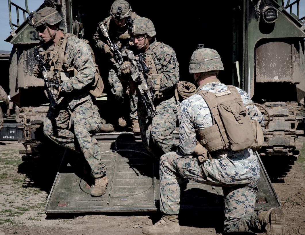 U.S. Marines with 2nd Battalion, 4th Marine Regiment, 1st Marine Division conduct a mechanized raid at Marine Corps Base Camp Pendleton, California on Jan. 29, 2020. 2nd Battalion, 4th Marine Regiment worked with 3d Assault Amphibian Battalion to conduct a mechanized raid to enhance lethality and hone combat skills. (U.S. Marine Corps photo by Sgt. Teagan Fredericks)