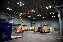 Soldiers from 531st Hospital Center set up mobile work stations in the Javits New York Medical Station.