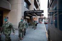 A Navy medical support team assigned to Javits New York Medical Station arrives at North Central Bronx Hospital, in the Bronx, N.Y., April 12, 2020.