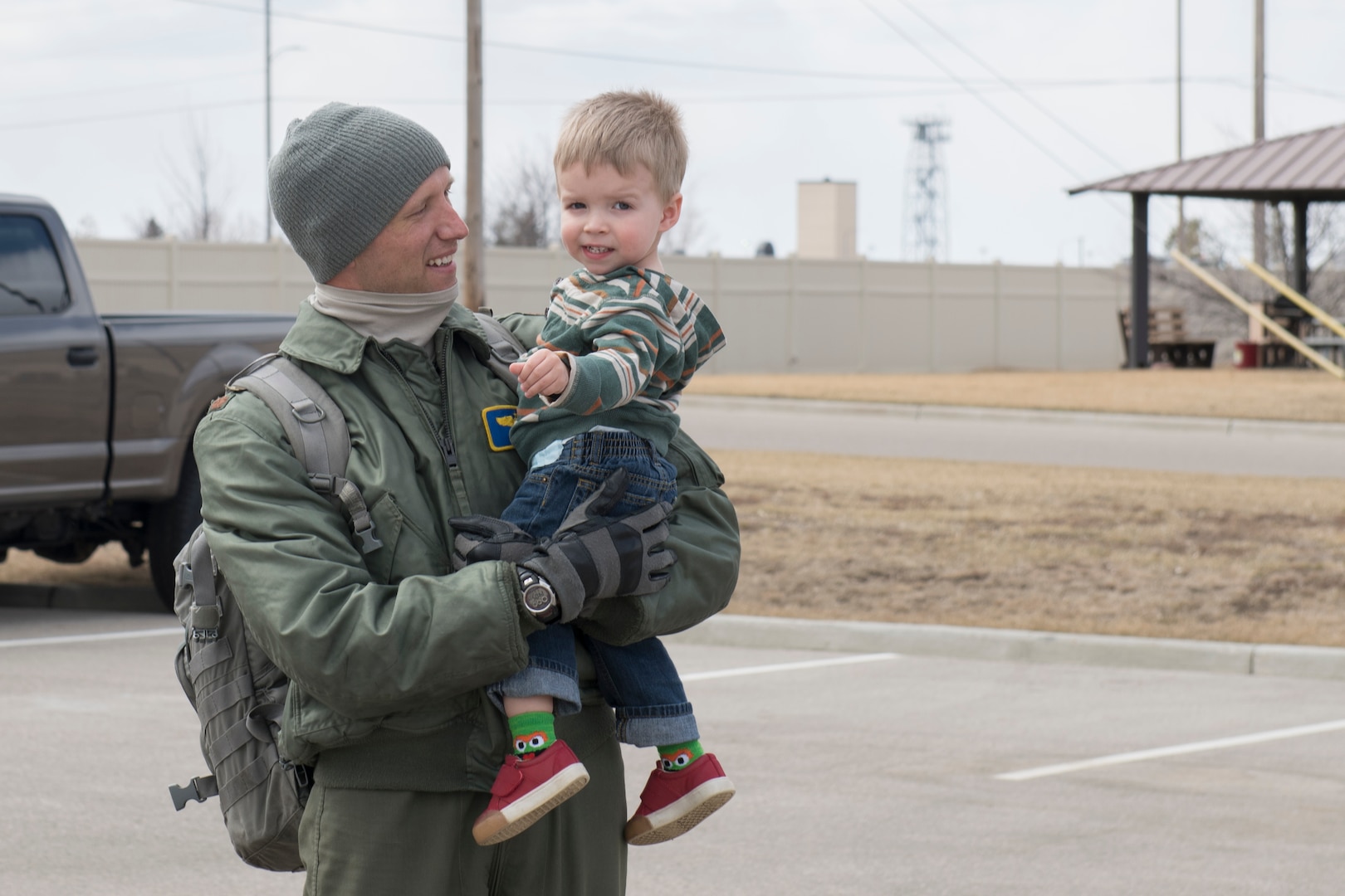 A pilot hold his son