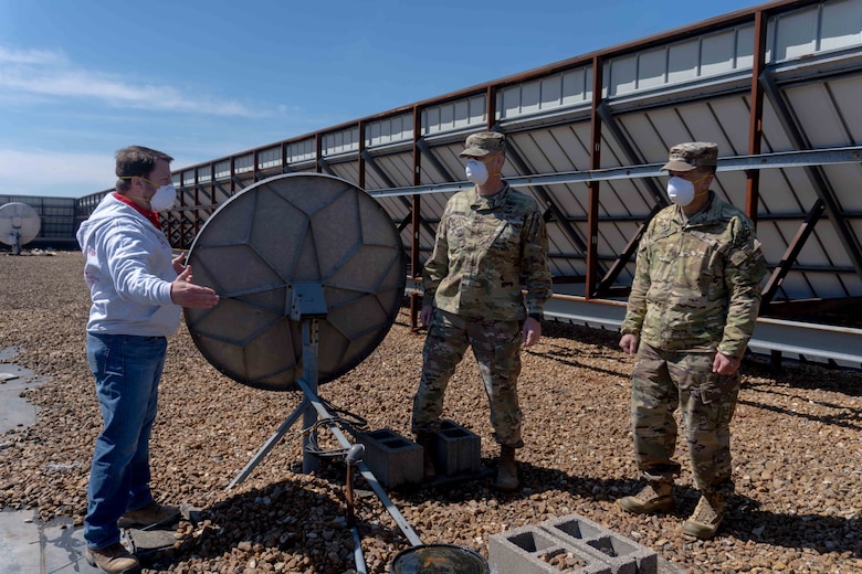 U.S. Army Maj. Gen. Mark Toy, Mississippi Valley Division commander, and Brig. Gen. Levon Cumpton, Missouri National Guard adjutant general, tour the alternate care site in St. Louis, Missouri, April 13, 2020. The site was developed to support health care facilities in the area. (U.S. Air National Guard photo by Senior Airman Audrey Chappell)