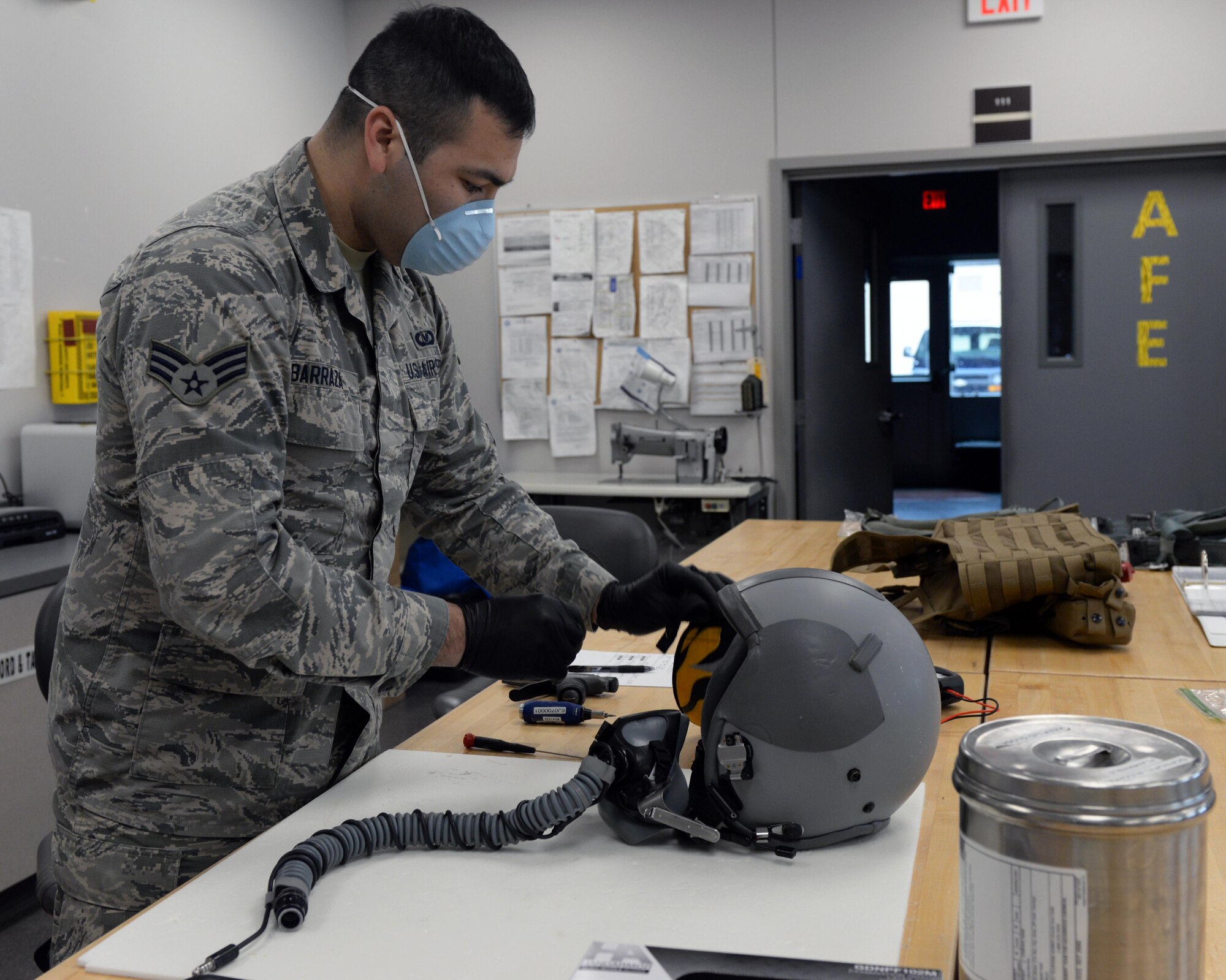 Airman prepares helmet