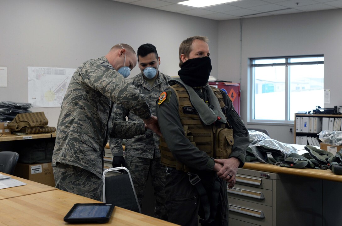 A photo of people prepping for flight.