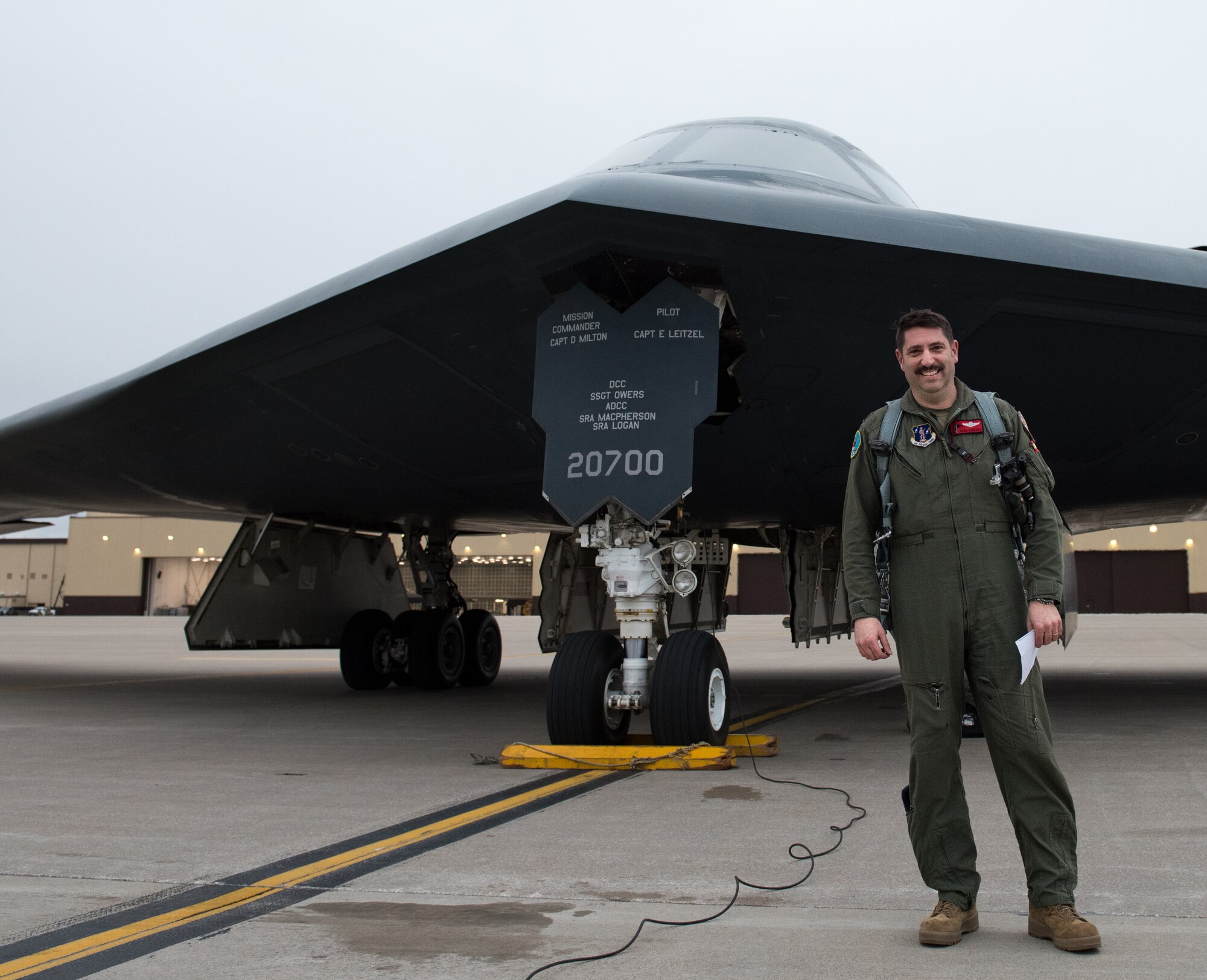 U.S. Air Force Lt. Col. James Ashlock, 131st Bomb Wing director of plans and programs, stands in front of a B-2 Spirit stealth bomber at Whiteman Air Force Base, Missouri, March 18, 2020. Throughout Ashlock’s career, he has completed 208 sorties,  during his final flight before retiring he reached the milestone of flying 1000 hours in a B-2. (U.S. Air Force photo by Airman 1st Class Christina Carter)