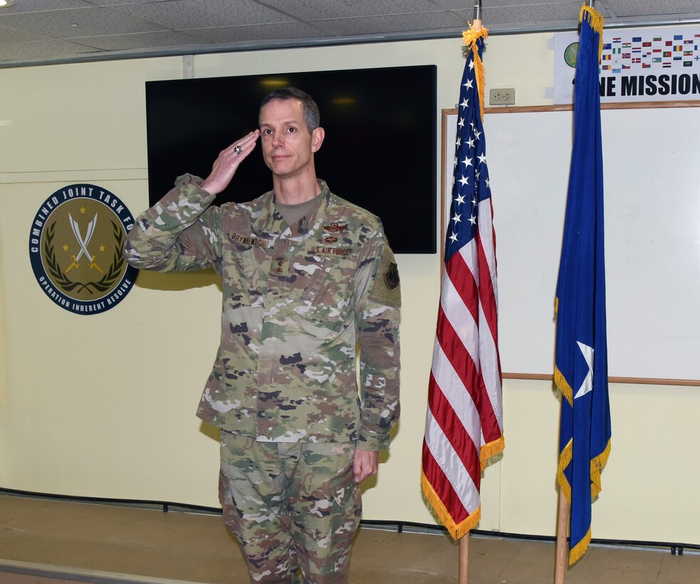 Maj. Gen. Alexus G. Grynkewich, the outgoing 9th Air Expeditionary Task Force-Levant commander, salutes as he relinquishes command of the 9 AETF-L at Camp Arifjan, Kuwait, April 20, 2020.