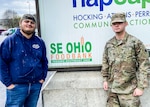 Devin Berry, left, and Ohio National Guard Pfc. Jayden Rutter, both lifelong Southeast Ohio residents, outside the Southeast Ohio Foodbank in Logan April 10, 2020. Berry, a laborer at the food bank for five years, has been working with Rutter and other Soldiers of the 237th Support Battalion to package and distribute food during the COVID-19 pandemic.