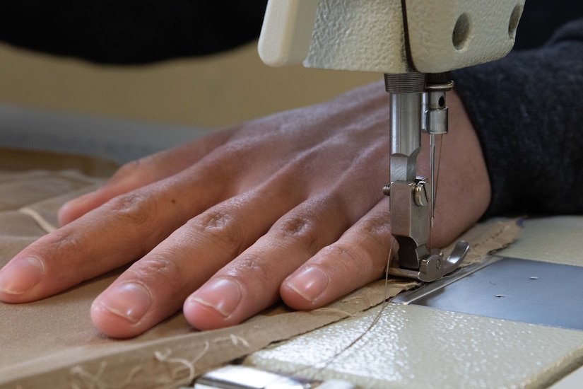 To slow the spread of COVID-19 among Soldiers and Airmen in the Utah National Guard, parachute riggers with 19th Special Forces Group (Airborne), at Camp Williams, use their skills to make approximately 2,000 face masks.