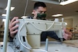 To slow the spread of COVID-19 among Soldiers and Airmen in the Utah National Guard, parachute riggers with 19th Special Forces Group (Airborne), at Camp Williams, use their skills to make approximately 2,000 face masks.