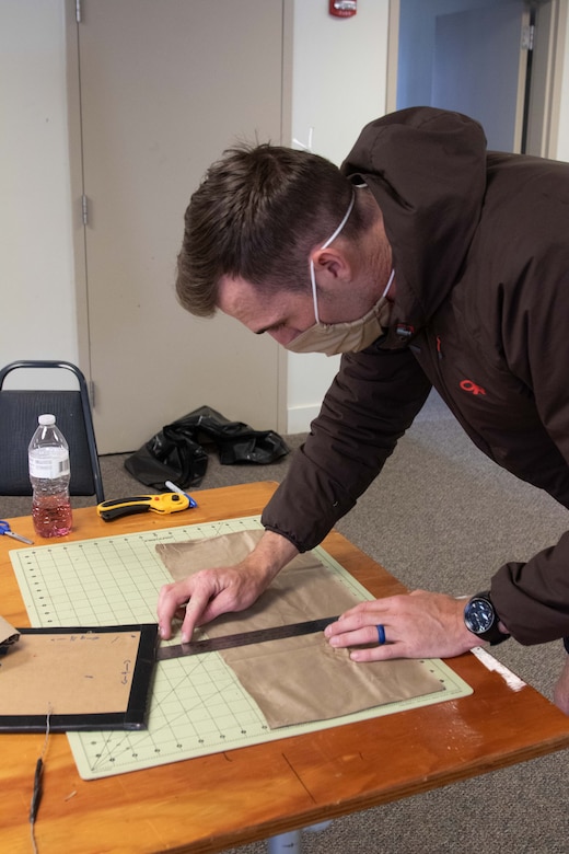 To slow the spread of COVID-19 among Soldiers and Airmen in the Utah National Guard, parachute riggers with 19th Special Forces Group (Airborne), at Camp Williams, use their skills to make approximately 2,000 face masks.