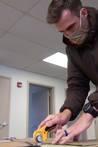 To slow the spread of COVID-19 among Soldiers and Airmen in the Utah National Guard, parachute riggers with 19th Special Forces Group (Airborne), at Camp Williams, use their skills to make approximately 2,000 face masks.