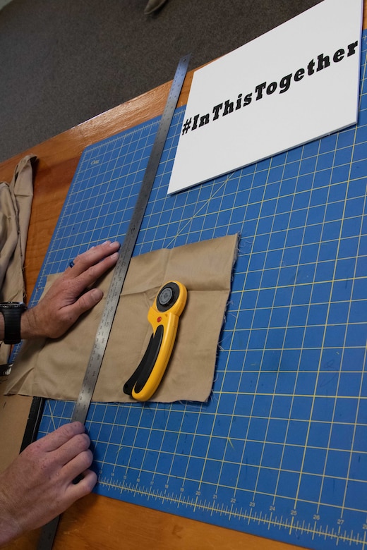 To slow the spread of COVID-19 among Soldiers and Airmen in the Utah National Guard, parachute riggers with 19th Special Forces Group (Airborne), at Camp Williams, use their skills to make approximately 2,000 face masks.