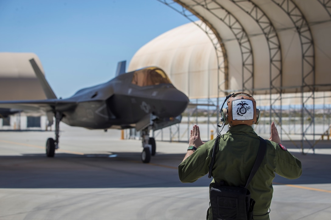U.S. Marines pilots fly new F-35B 's out of Marine Corps Air Station Yuma to be delivered to Forward Deployed Naval Forces, Japan on March 26.