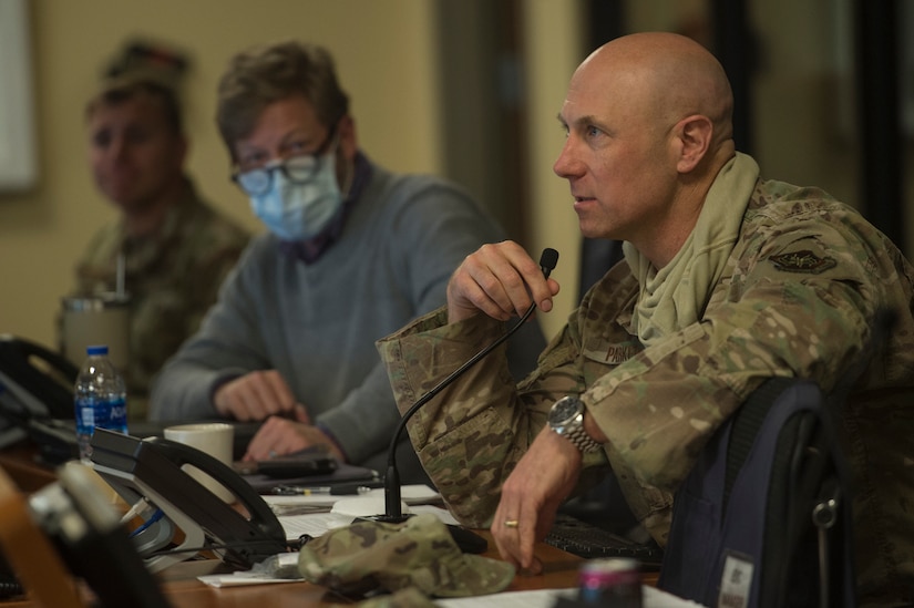 Lt. Col. William Parker, deputy commander of the 628th Mission Support Group and COVID-19 Working Group co-director, guides a meeting to check statuses on COVID-19 response tasks at the Emergency Operations Center located at Joint Base Charleston, S.C., April 16, 2020. Through the collaboration of ideas and perspectives, the group’s mission is to create possible solutions and generate recommendations for JB Charleston leaders. Their work allows commanders to make sound decisions affecting the installation and mission during the global pandemic.