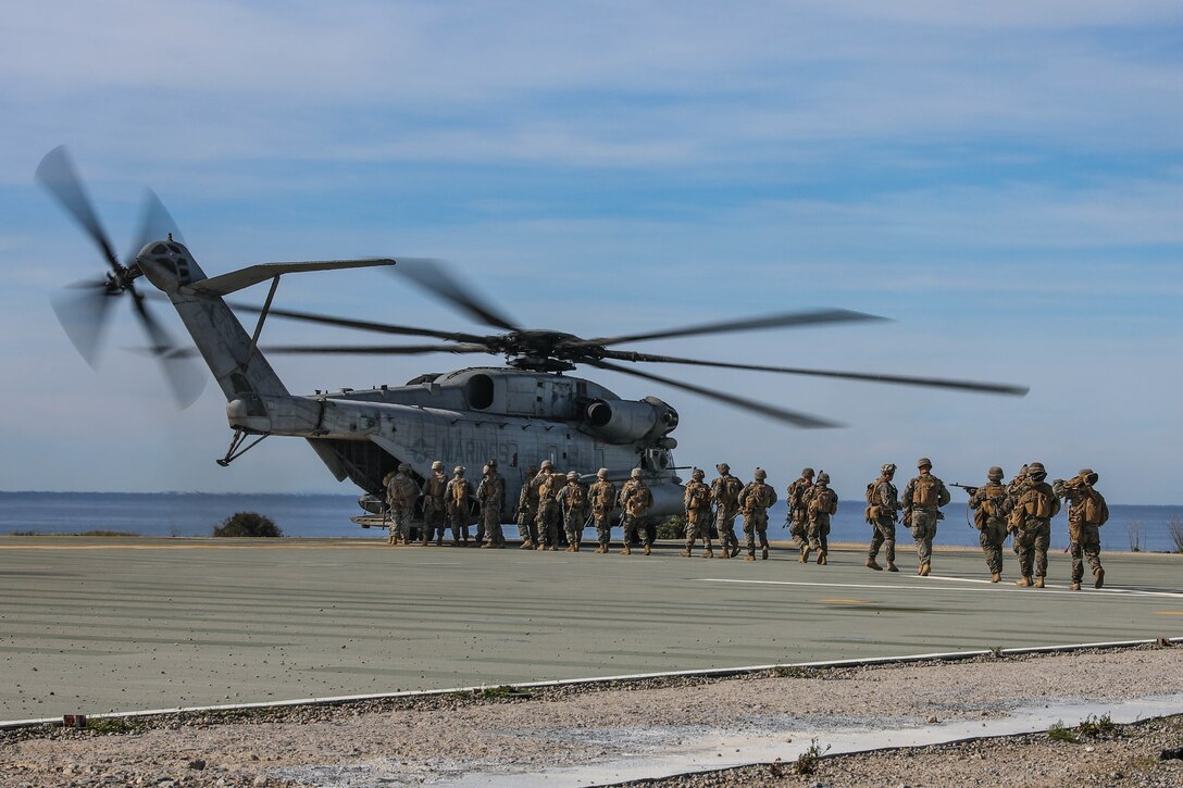 U.S. Marines with 2nd Battalion, 4th Marine Regiment, 1st Marine Division conduct a helo raid at Marine Corps Base Camp Pendleton, California, Feb. 5, 2020. The Marines were supported by 1st Law Enforcement Battalion and 1st Combat Engineer Battalion to enhance lethality and hone combat skills. (U.S. Marine Corps photo by Cpl. Austin Herbert)