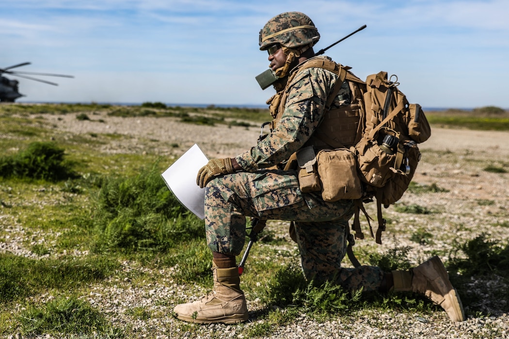 U.S. Marine Corps 1st Sgt. Eddie Chea, first sergeant of 2nd Battalion, 4th Marine Regiment, 1st Marine Division conducts a helo raid at Marine Corps Base Camp Pendleton, California, Feb. 5, 2020. The Marines were supported by 1st Law Enforcement Battalion and 1st Combat Engineer Battalion to enhance lethality and hone combat skills. (U.S. Marine Corps photo by Cpl. Austin Herbert)