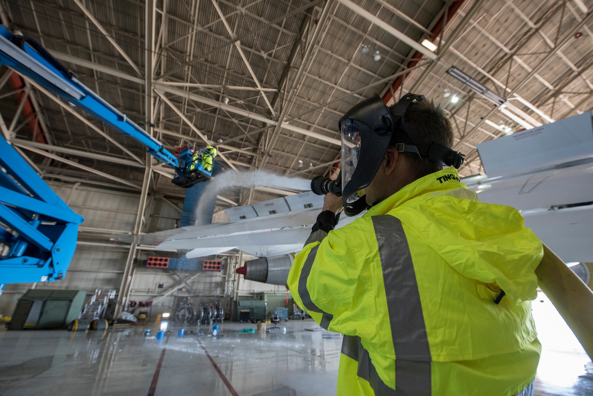 An airman cleans an E-4B at Offutt Air Force Base