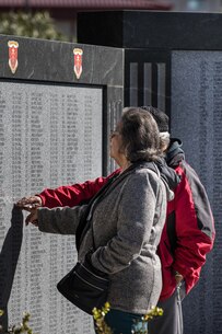 Retired U.S. Marine Corps Gunnery Sgt. Carlos Mariscal and his wife gathered at the 5th Marine Regiment Memorial Garden during 1st Marine Division’s 79th Anniversary on Marine Corps Base Camp Pendleton, California, Jan. 30, 2020. The veterans visited the memorial to honor those Marines and Sailors who gave the ultimate sacrifice while serving with 1st Marine Division. (U.S. Marine Corps photo by Cpl. Alexa M. Hernandez)