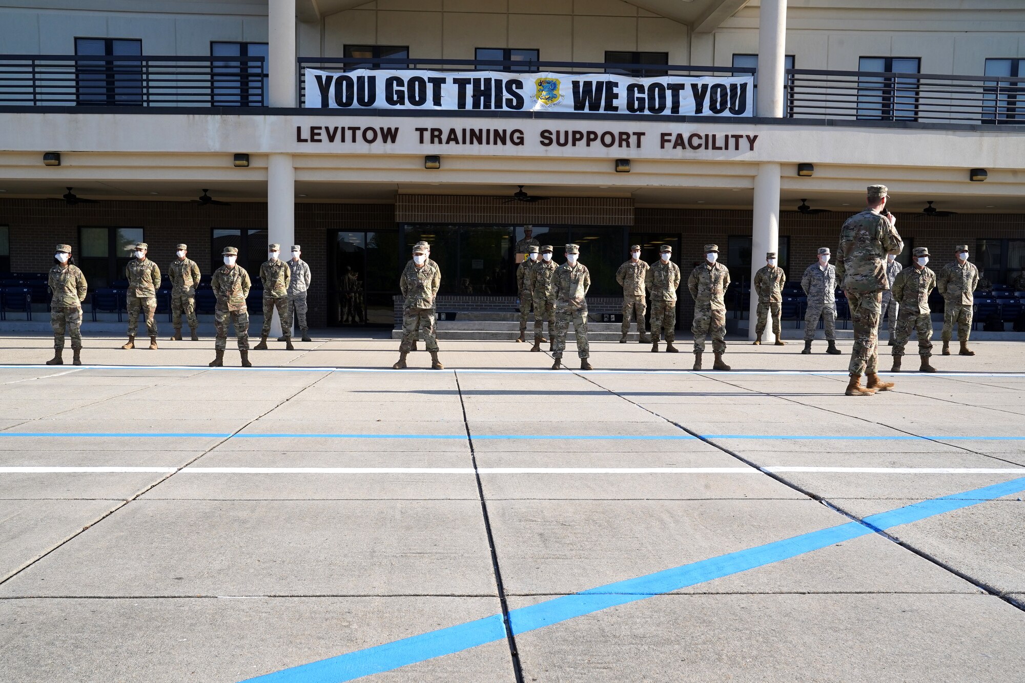 Students from the 335th Training Squadron participate in a Financial Management Course graduation at the Levitow Training Support Facility drill pad at Keesler Air Force Base, Mississippi, April 21, 2020. The class was the first to complete the updated Financial Management Course, which was recently introduced by the 335th TRS to improve the quality and efficiency of the class. (U.S. Air Force photo by Airman 1st Class Seth Haddix)