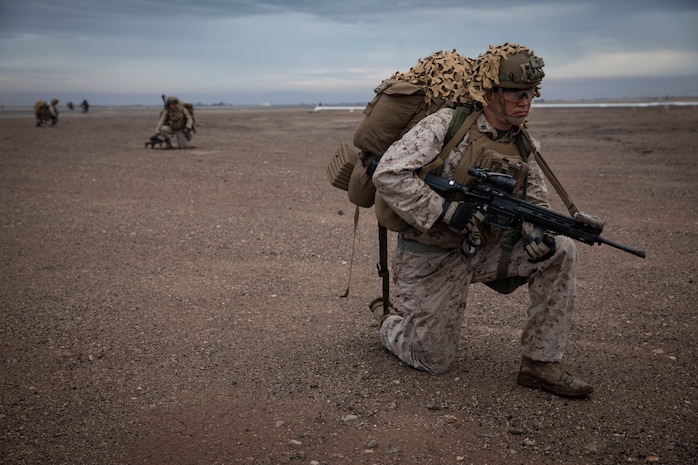 U.S. Marine Corps Cpl. Jonah Massey, an infantry assault Marine with 2nd Battalion, 5th Marine Regiment, 1st Marine Division, patrols during exercise Steel Knight 20 (SK20) at Naval Air Facility El Centro, California, Dec. 7, 2019. SK20 increases the ability of all participants to plan, communicate and conduct operations against a capable near-peer adversary with a focus on major combat maneuvers and sustainment. (U.S. Marine Corps photo by Sgt. Alina Thackray)