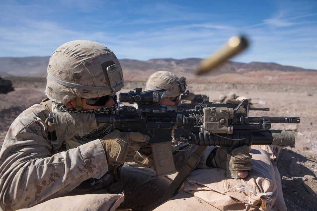 U.S. Marine Corps Lance Cpl. Darrion Green a Rifleman with 1st Battalion, 3rd Marine Regiment, 3rd Marine Division holds the defense during the Intergraded Training Exercise (ITX) at Marine Air Ground Combat Center Twentynine Palms. Jan. 25, 2020. ITX is a month long training event that prepares Marines for deployment and contains multiple ranges that applies combined-arms maneuver and offensive and defensive operations during combat. (U.S. Marine Corps photo by Cpl. Jack C. Howell)