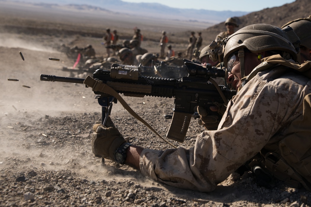U.S. Marine Corps Lance Cpl. Darrion Green, a rifleman with 2nd Battalion, 5th Marine Regiment, 1st Marine Division, holds the defense during the Integrated Training Exercise (ITX) at Marine Air Ground Combat Center Twentynine Palms, California, Jan. 25, 2020. ITX is a month-long training event that applies combined-arms maneuver and offensive and defensive operations to prepare Marines for deployment. (U.S. Marine Corps photo by Cpl. Jack C. Howell)